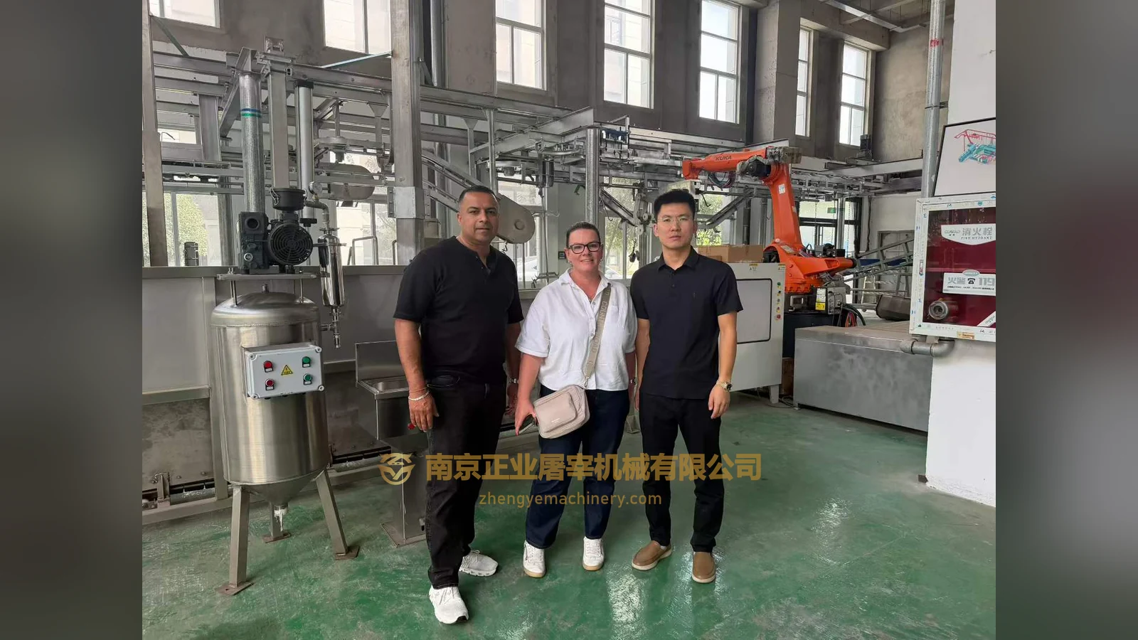 Australian clients with Mr. Chen of Zhengye Slaughter Machinery beside workshop equipment, 16 October 2026