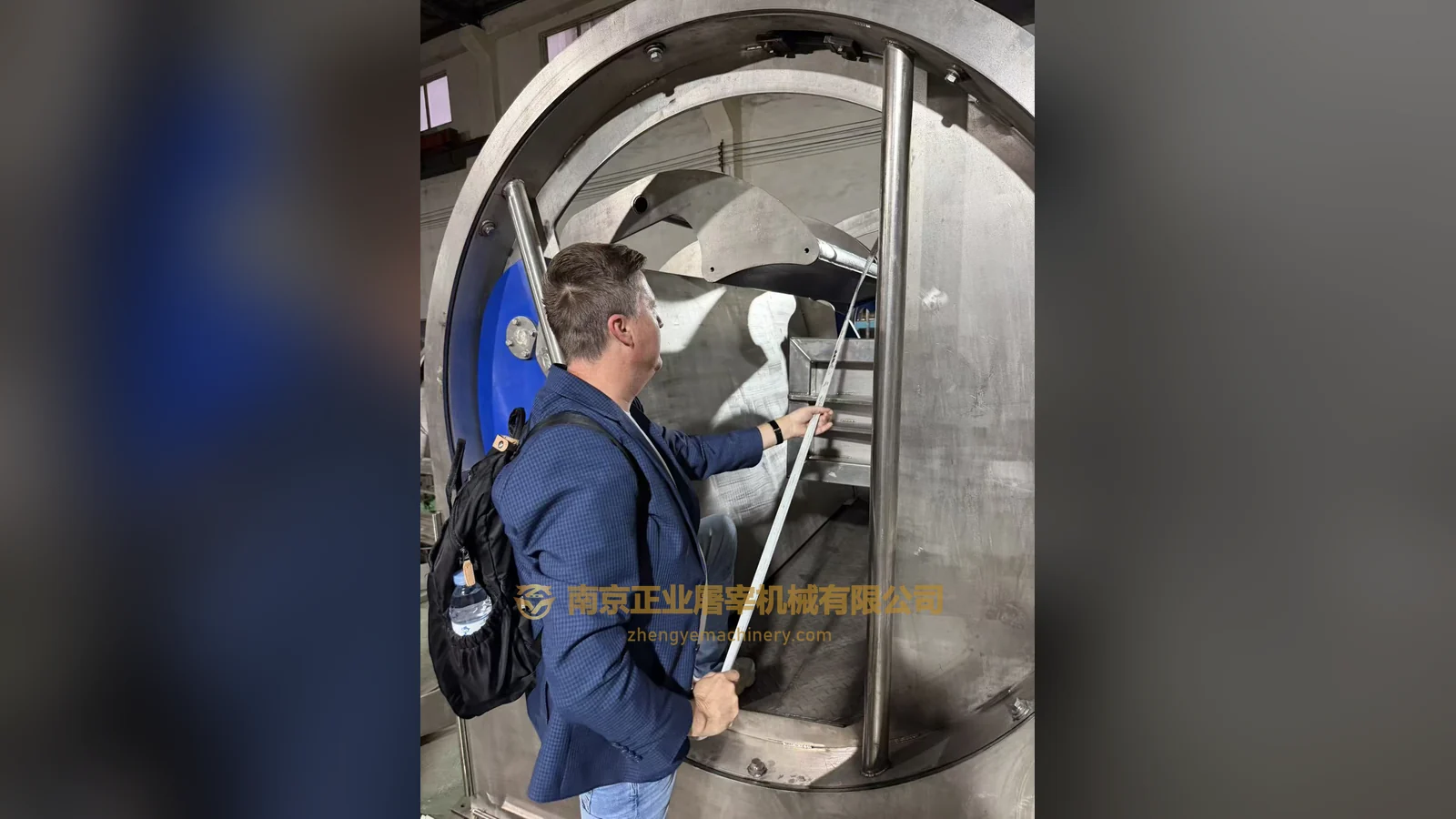 Polish clients measure the interior dimensions of the rotary ritual slaughter box